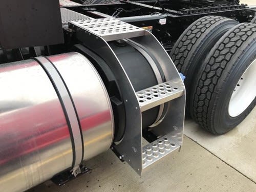 DEF tank steps improve overall spacing and mobility